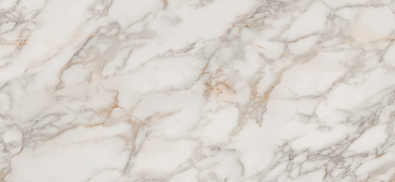 White marble texture with gray and subtle tan veins running across a smooth surface.