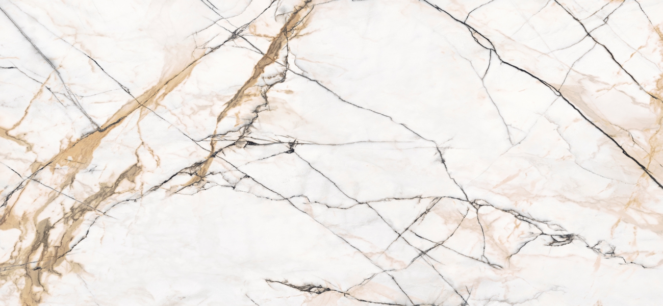 White marble surface with gray and beige veining across the slab.